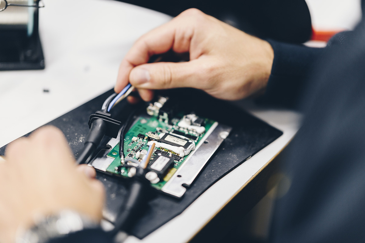 Engineer working on a custom electric solution for industry usage.