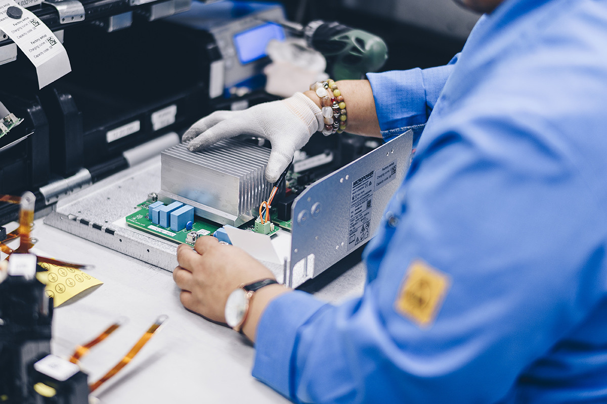 Engineer working on a custom electrical solution