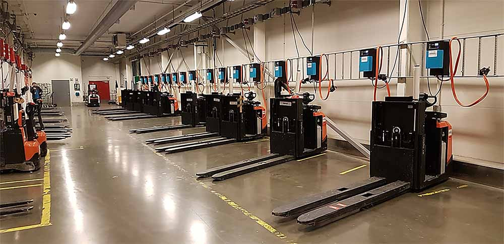 A forklift fleet battery charging system at work.