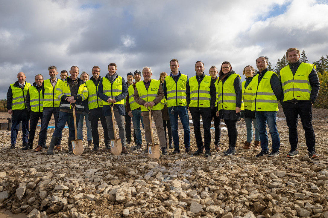 Group of people in yellow vests